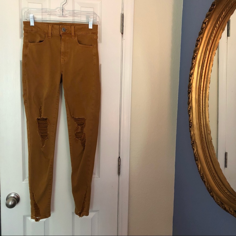 Gold/Ochre distressed American Eagle stretch skinny jeans